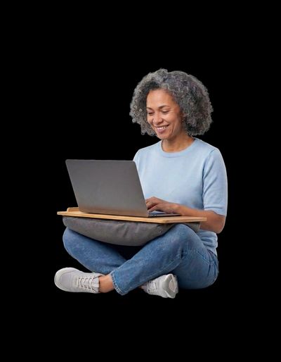 Woman looking relaxed using laptop